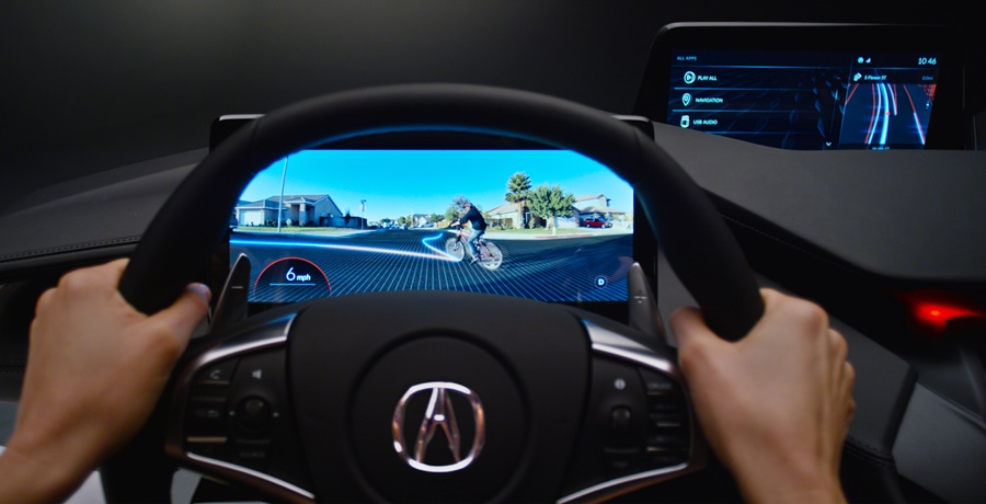 An advanced vision mode leverages sensors and artificial intelligence to display cars, pedestrians, bicyclists and other objects – even those obscured from vision – using artificial intelligence to predict future pathways. This mode builds human confidence in the car’s automated driving systems.